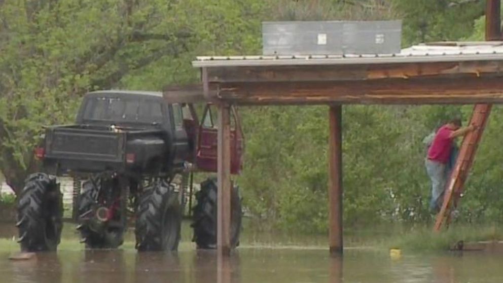 PHOTO: A Texas man rescues neighbors in his monster truck after major flooding. 