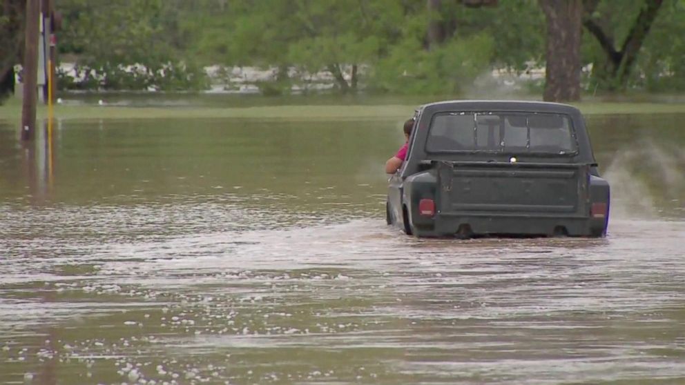 PHOTO: A Texas man rescues neighbors in his monster truck after major flooding. 