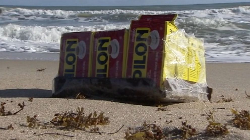 In addition to coffee -- dog food, ramen noodles and laundry detergent washed ashore a beach in Fort Pierce, Fla. on Nov. 9, 2015. 