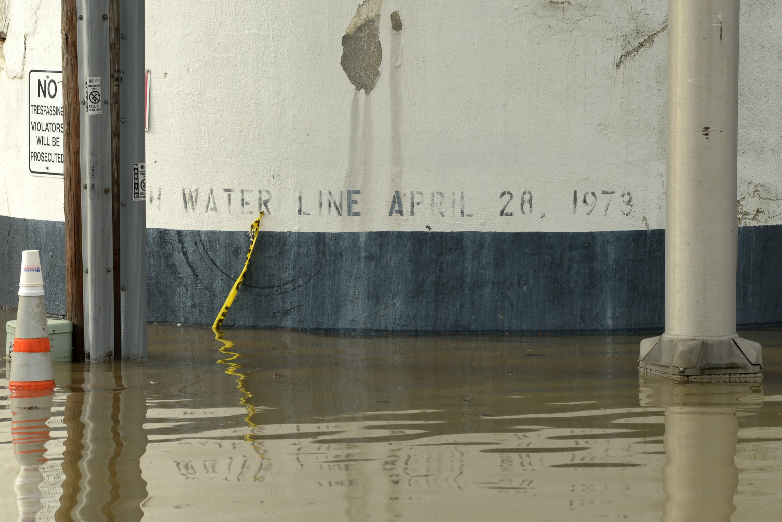 PHOTO: Flood water near the Ardent Mills get close to historic flood level of 1973. The black band on the silo wall indicates the level of water during the April 28, 1973 floods.