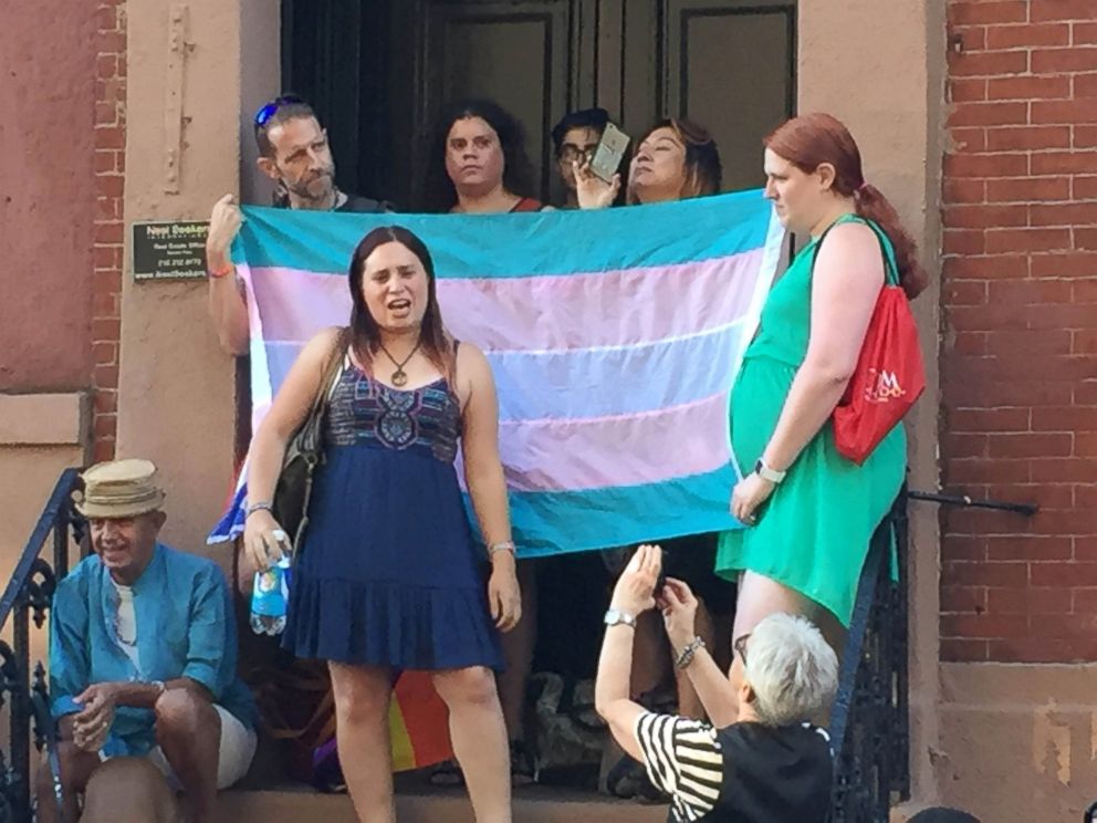 PHOTO: People gather outside the Stonewall Inn in New York City to pay tribute to the victims of a mass shooting at a gay club in Orlando, June 12, 2016.