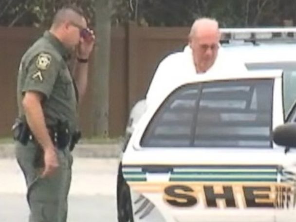 PHOTO: Theater shooting suspect Curtis Reeves, is escorted into a squad car, Jan. 13, 2014.