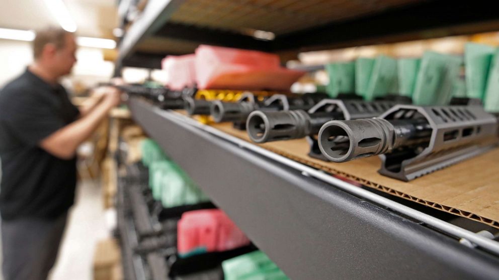 PHOTO: Finished AR-15 rifle barrels are stacked on shelves at Delta Team Tactical in Orem, Utah on March 20, 2020. - Gun stores in the US are reporting a surge in sales of firearms as coronavirus fears trigger personal safety concerns.