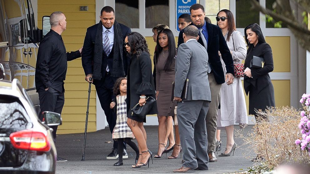Shayanna Jenkins Hernandez, front, fiancee of former New England Patriots tight end Aaron Hernandez, arrives with their daughter Avielle Janelle Hernandez, and Pittsburgh Steeler Center Maurkice Pouncey and his twin brother Mike for a private service for Aaron Hernandez at O'Brien Funeral Home, April 24, 2017, in Bristol, Conn. The former New England Patriots tight end was found hanged in his cell in a maximum-security prison in Massachusetts on April 19.