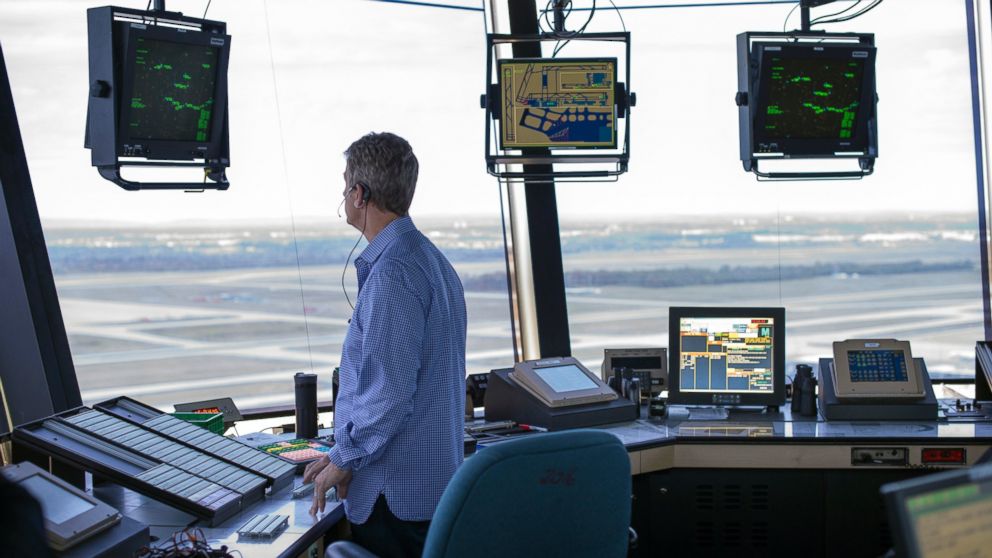 FAA Air Traffic Controller works in the Dulles International Airport Air Traffic Control Tower in Sterling, Va., Sept. 27, 2016. 
