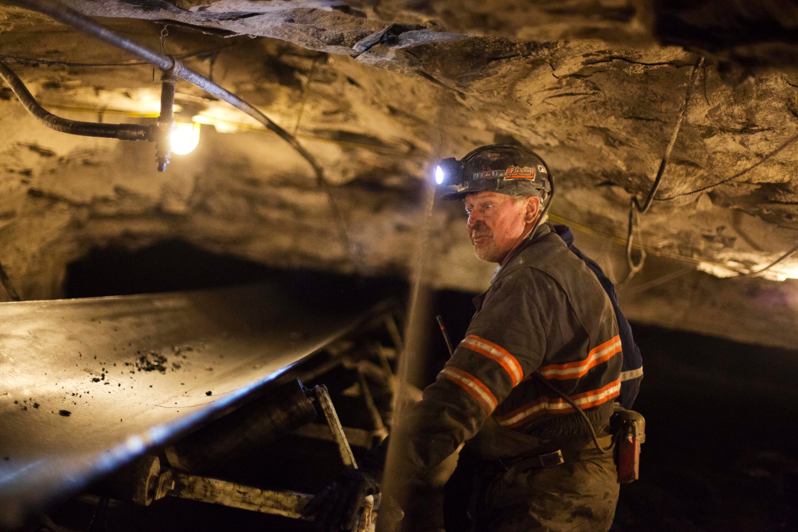 PHOTO: Scott Tiller, a coal miner of 32 years, looks over a belt moving coal out of an underground mine in Welch, W.Va on May 11, 2016.  
