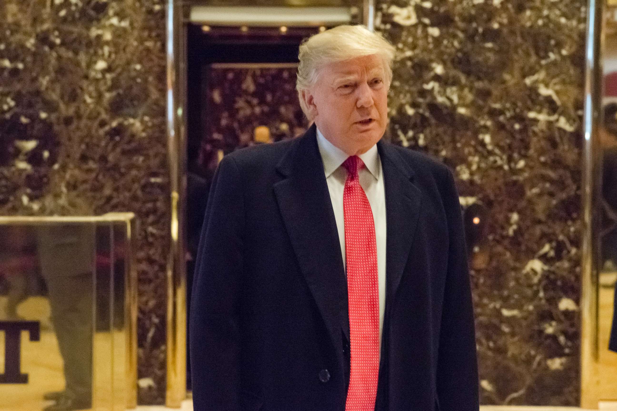 PHOTO: President-elect Donald Trump made a rare appearance in the lobby of Trump Tower, addressing reporters in New York City, on Dec. 6, 2016.