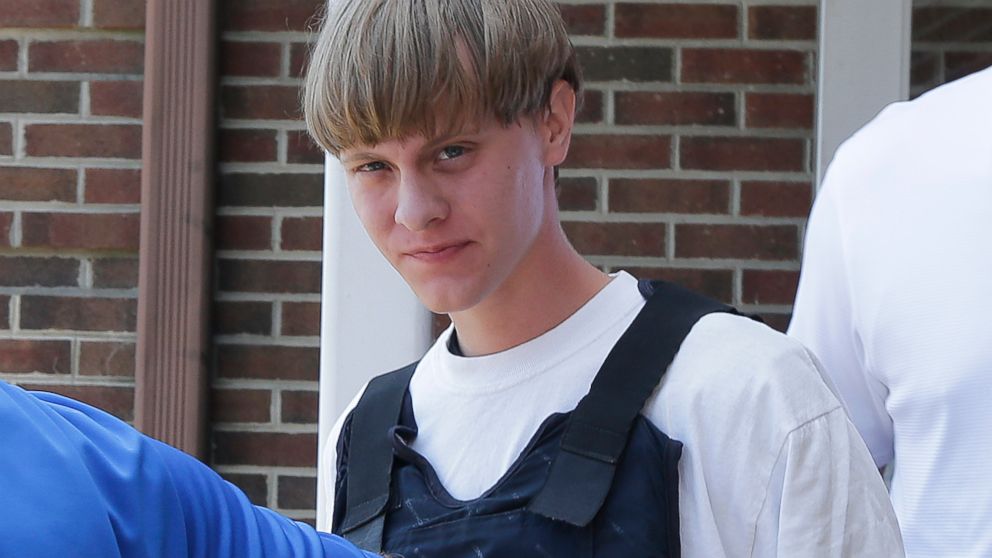 In this June 18, 2016 file photo, Dylann Storm Roof is escorted from the Shelby Police Department in Shelby, North Carolina. 