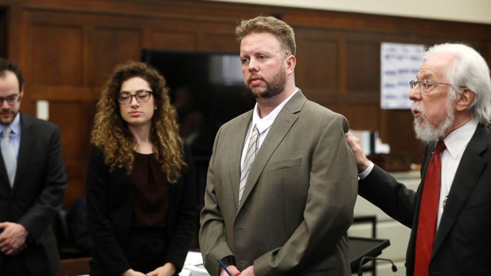 Defense attorney Jonathan Shapiro, right, introduces Michael McCarthy, center, to potential jurors as jury selection begins in Suffolk Superior Court, May 22, 2017, in Boston.