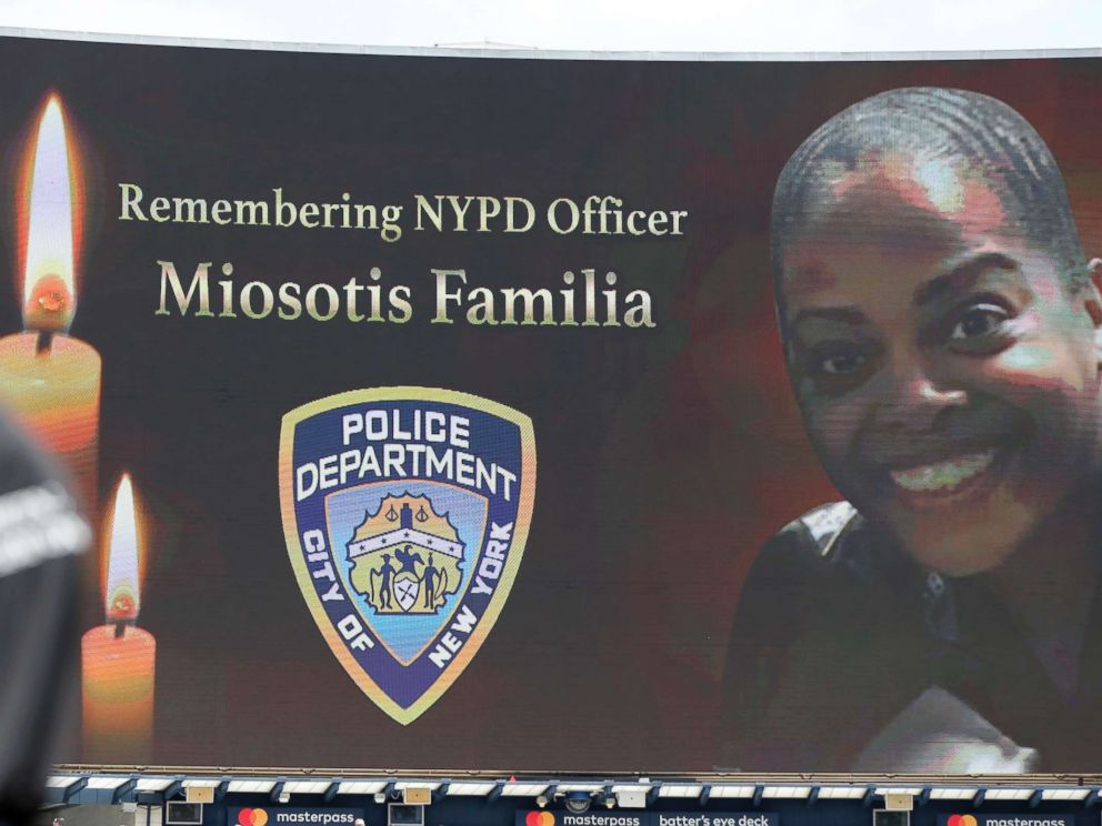 PHOTO: A security guard stands at attention as New York Police Department officer Miosotis Familia is memorialized before the start of a baseball game between the New York Yankees and the Toronto Blue Jays in New York, July 5, 2017.