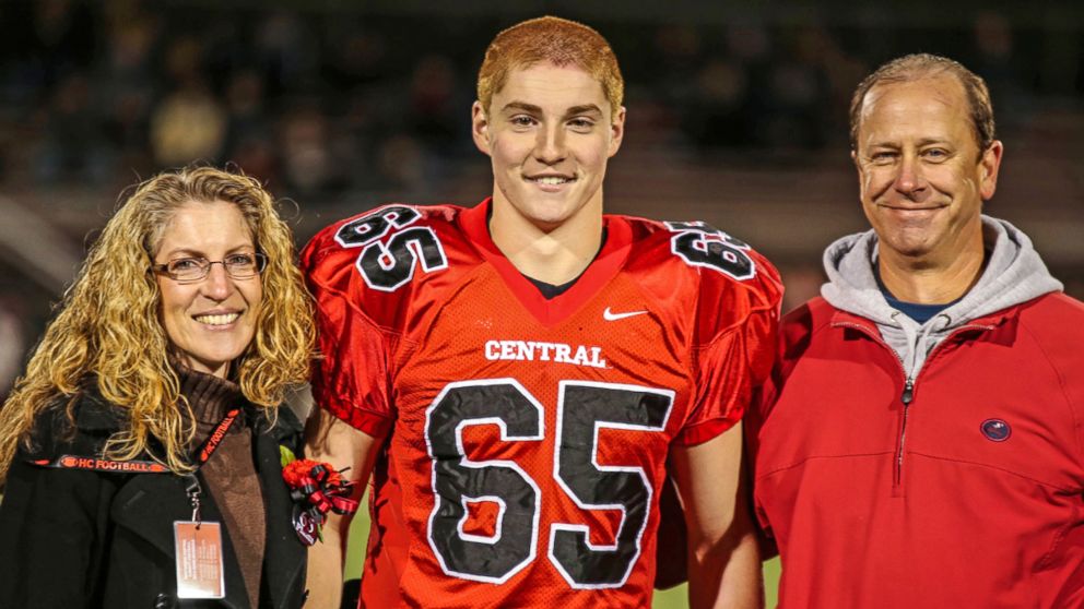 PHOTO: This Oct. 31, 2014, photo provided by Patrick Carns shows Timothy Piazza, center, with his parents Evelyn Piazza and James Piazza, during Hunterdon Central Regional High School football's "Senior Night," in Flemington, N.J. 