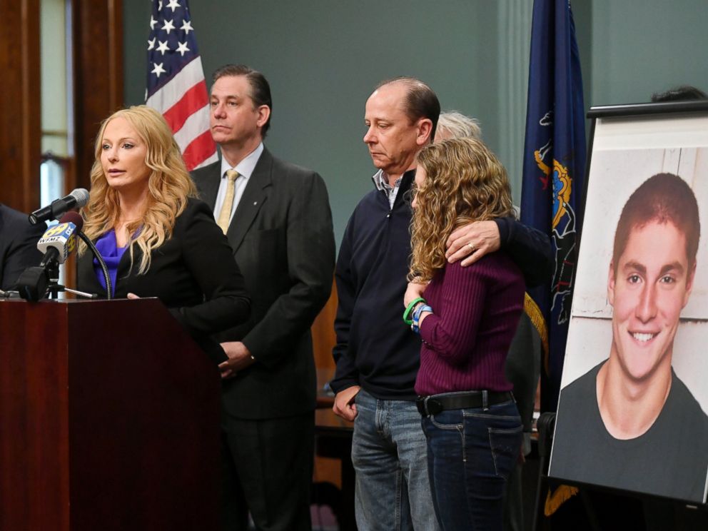 Jim and Evelyn Piazza, right, stand by as Centre County District Attorney Stacy Parks Miller, second from left, announces the results of an investigation into the death of their son Timothy Piazza during a press conference, May 5, 2017, in Bellefonte, Pa.