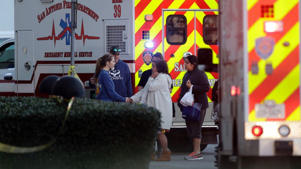 PHOTO: People are attended to outside after a deadly shooting at the Rolling Oaks Mall, Jan. 22, 2017, in San Antonio, Texas. 