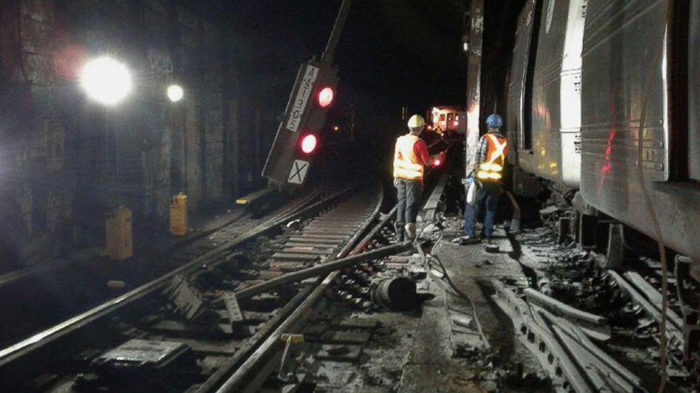 PHOTO: In this photo provided by the Transport Workers Union, Local 100, workers from the New York Metropolitan Transportation Authority respond to the scene of a subway derailment, June 27, 2017, in New York City. 