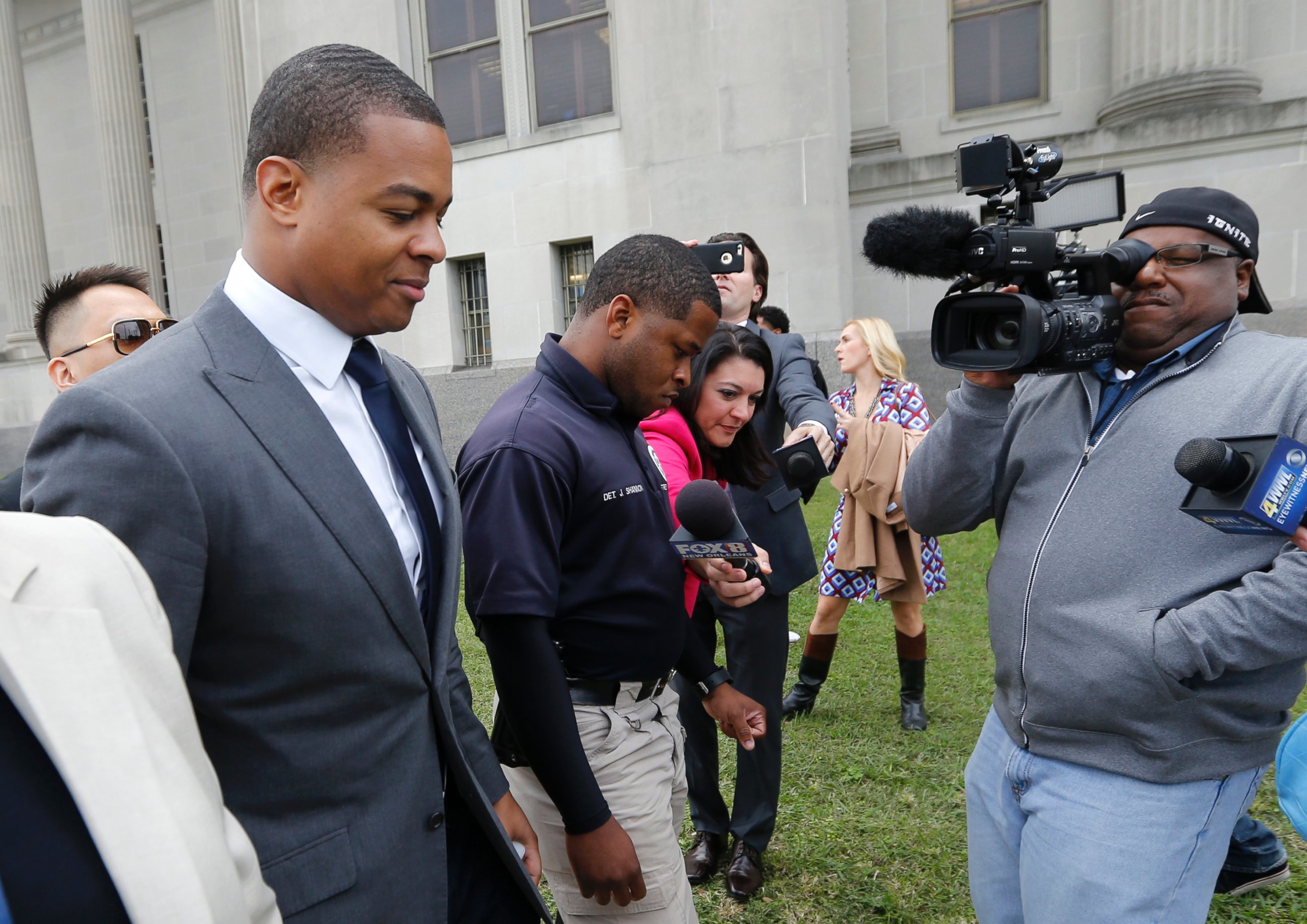 PHOTO: Former New Orleans Saints running back Pierre Thomas, left, who was with former teammate Will Smith the night he was killed, leaves Orleans Parish Criminal District Court on Dec. 7, 2016, after testifying in the trial of Cardell Hayes. 