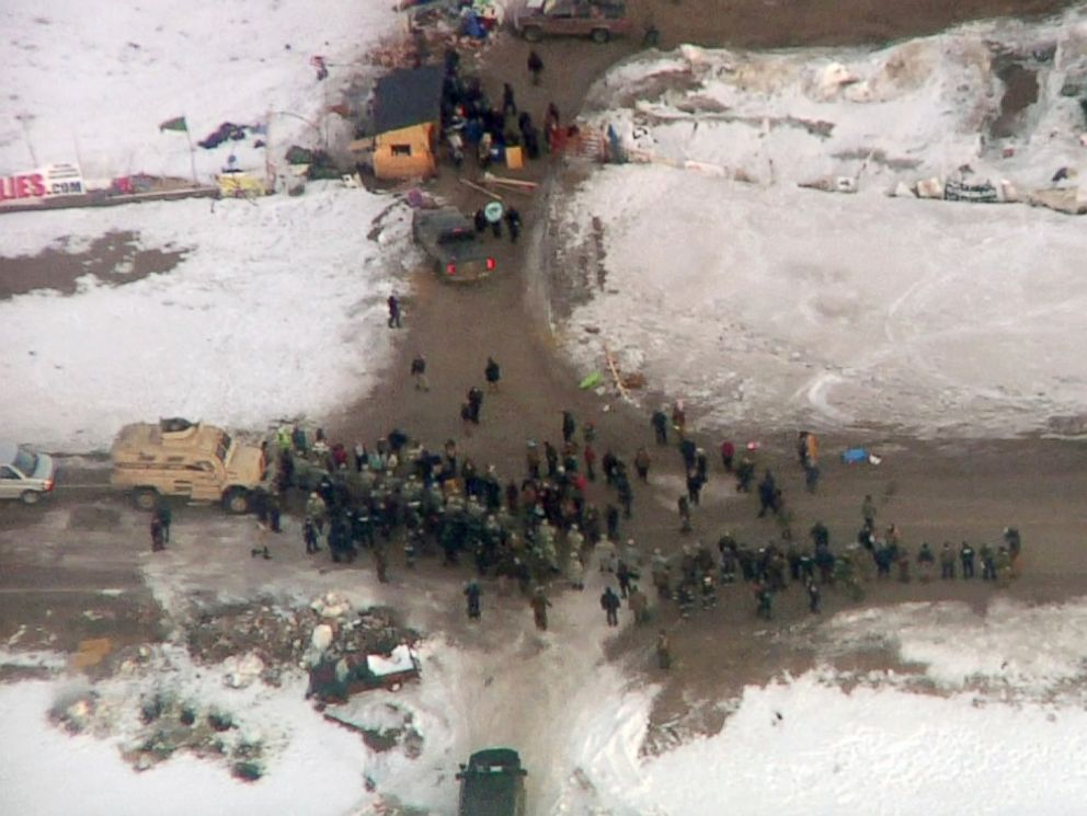 PHOTO: Law enforcement officers line up against protesters during the eviction of about 40 Dakota Access pipeline opponents from a camp on private property in southern North Dakota near Cannon Ball, North Dakota, Feb. 1, 2017.