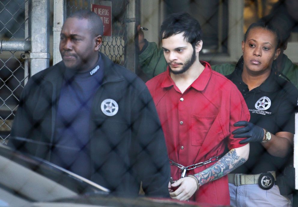 PHOTO: Esteban Santiago, center, is led from the Broward County jail for an arraignment in federal court, Monday, Jan. 30, 2017, in Fort Lauderdale, Florida. 