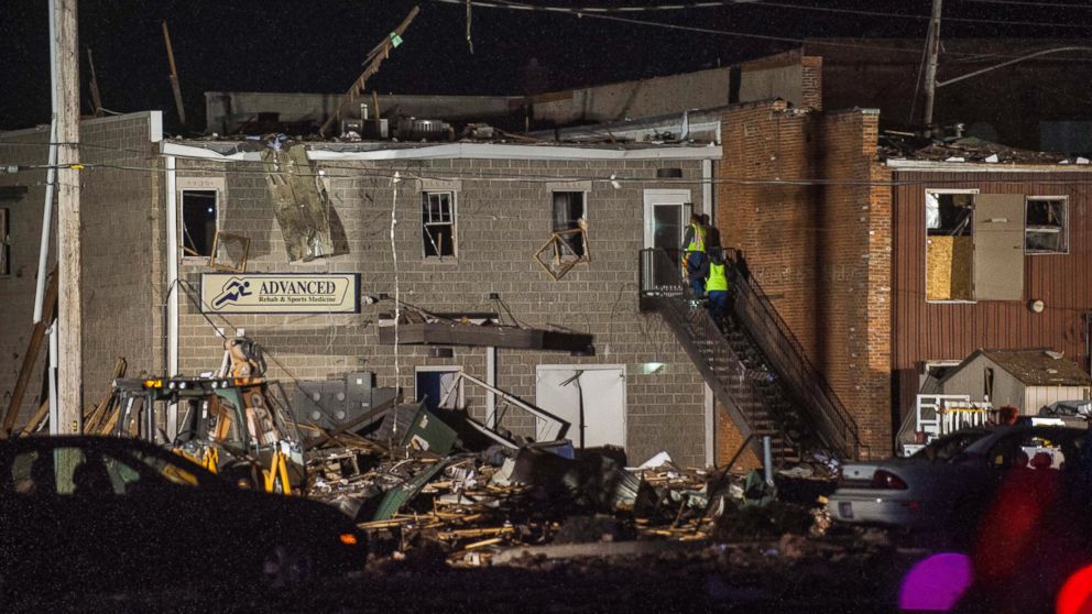 PHOTO: Emergency personnel investigate the damage done from an explosion to Advanced Rehab and Sports Medicine in Canton, Illinois, Nov. 16, 2016.