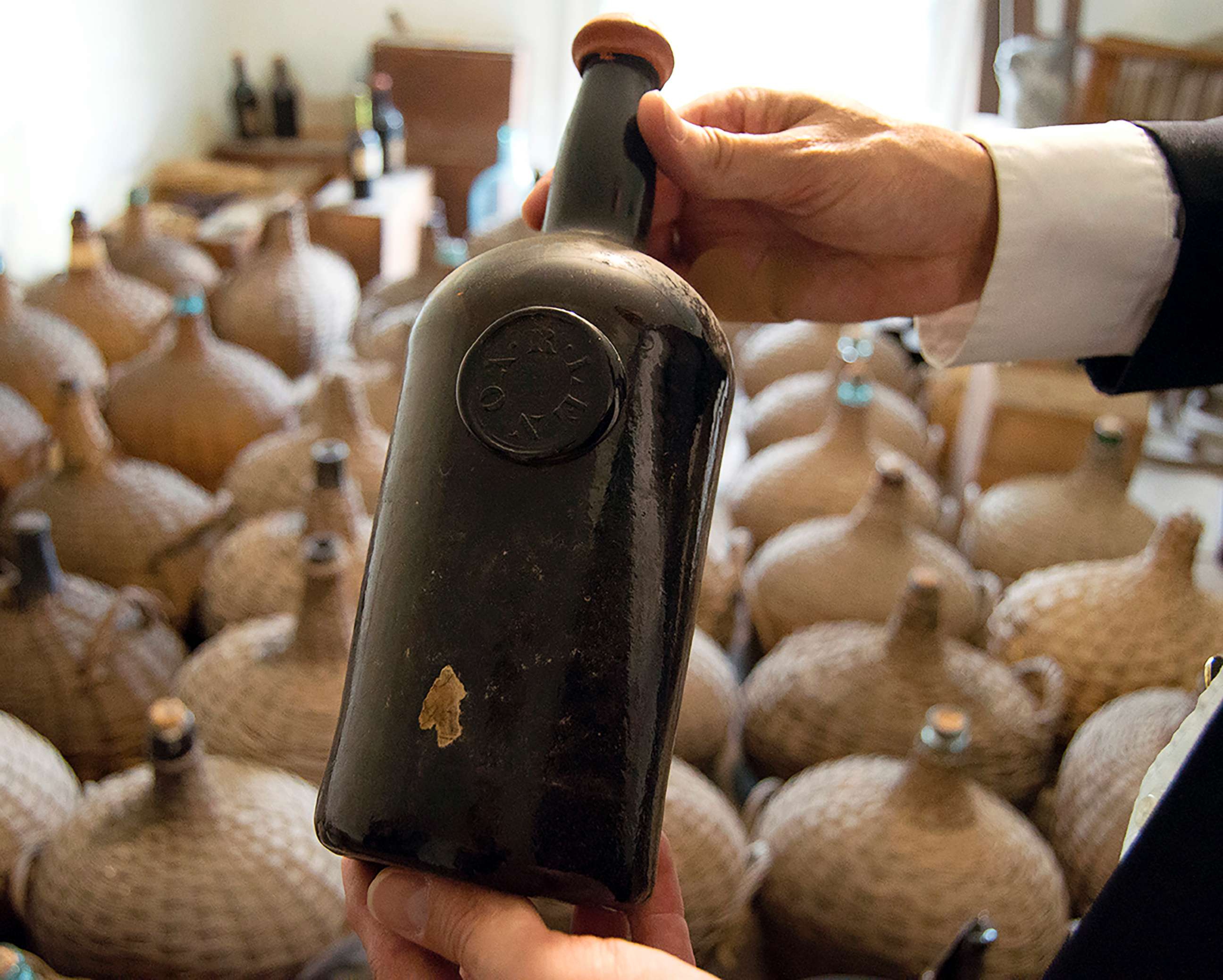 PHOTO: A six-month restoration project at Liberty Hall Museum in Union, N.J., uncovered three cases of Madeira wine dating to 1796 and about 42 demijohns from the 1820s while restoring its wine cellar. 