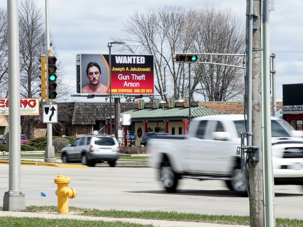PHOTO: In this Thursday, April 6, 2017 photo, vehicles drive by an electronic billboard in Janesville, Wis., showing a wanted sign for Joseph Jakubowski.