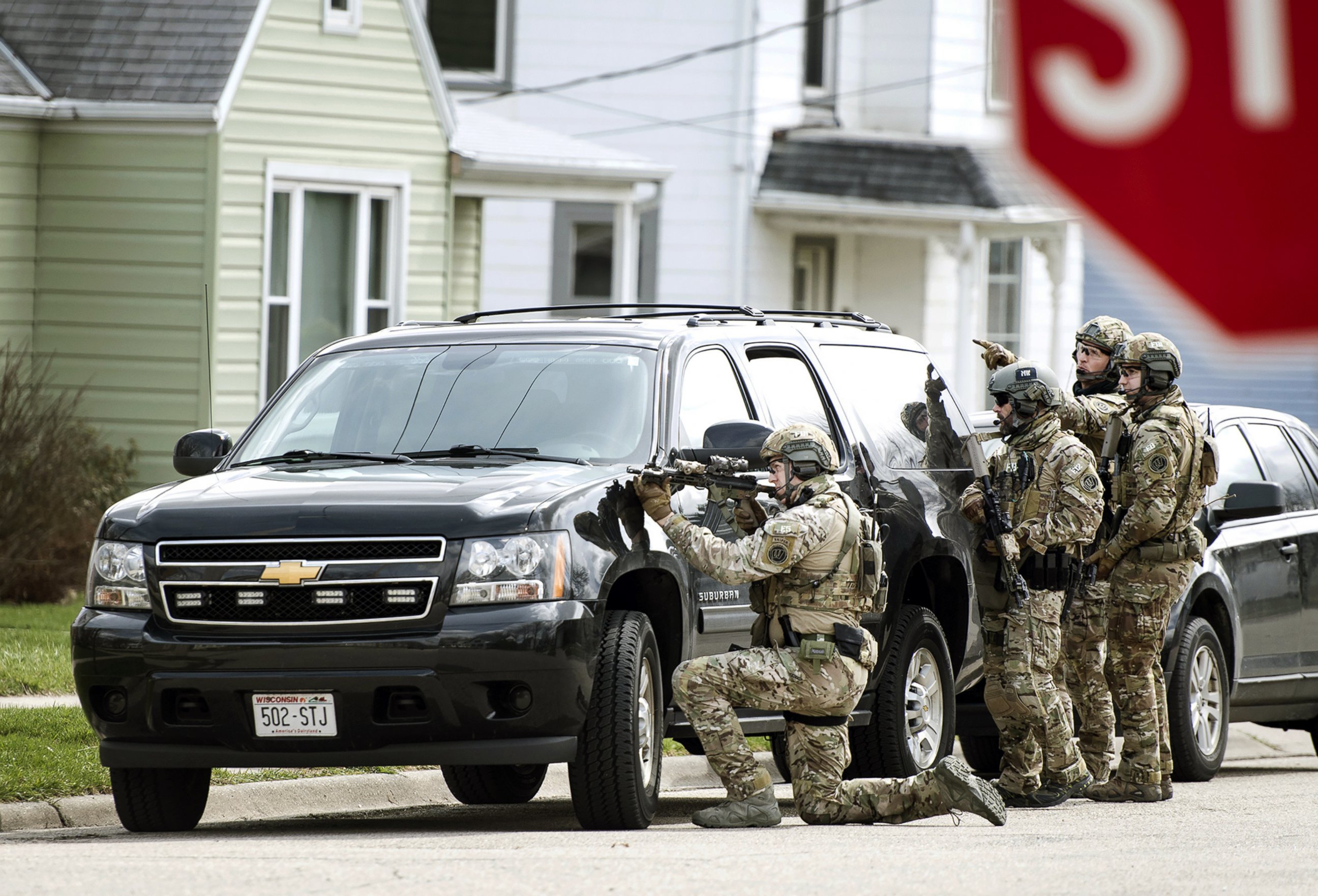 PHOTO: In this Thursday, April 6, 2017, photo, FBI agents provide tactical support to sheriff's detectives during a search for Joseph Jakubowski, in Janesville, Wis.
