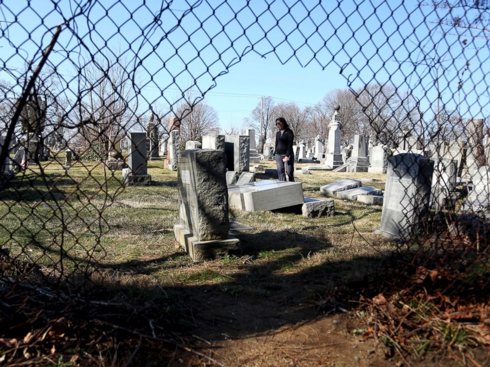 PHOTO: Stacy Biscardi searches the grounds of Mount Carmel Cemetery for a relatives grave in Philadelphia, Feb. 28, 2017.