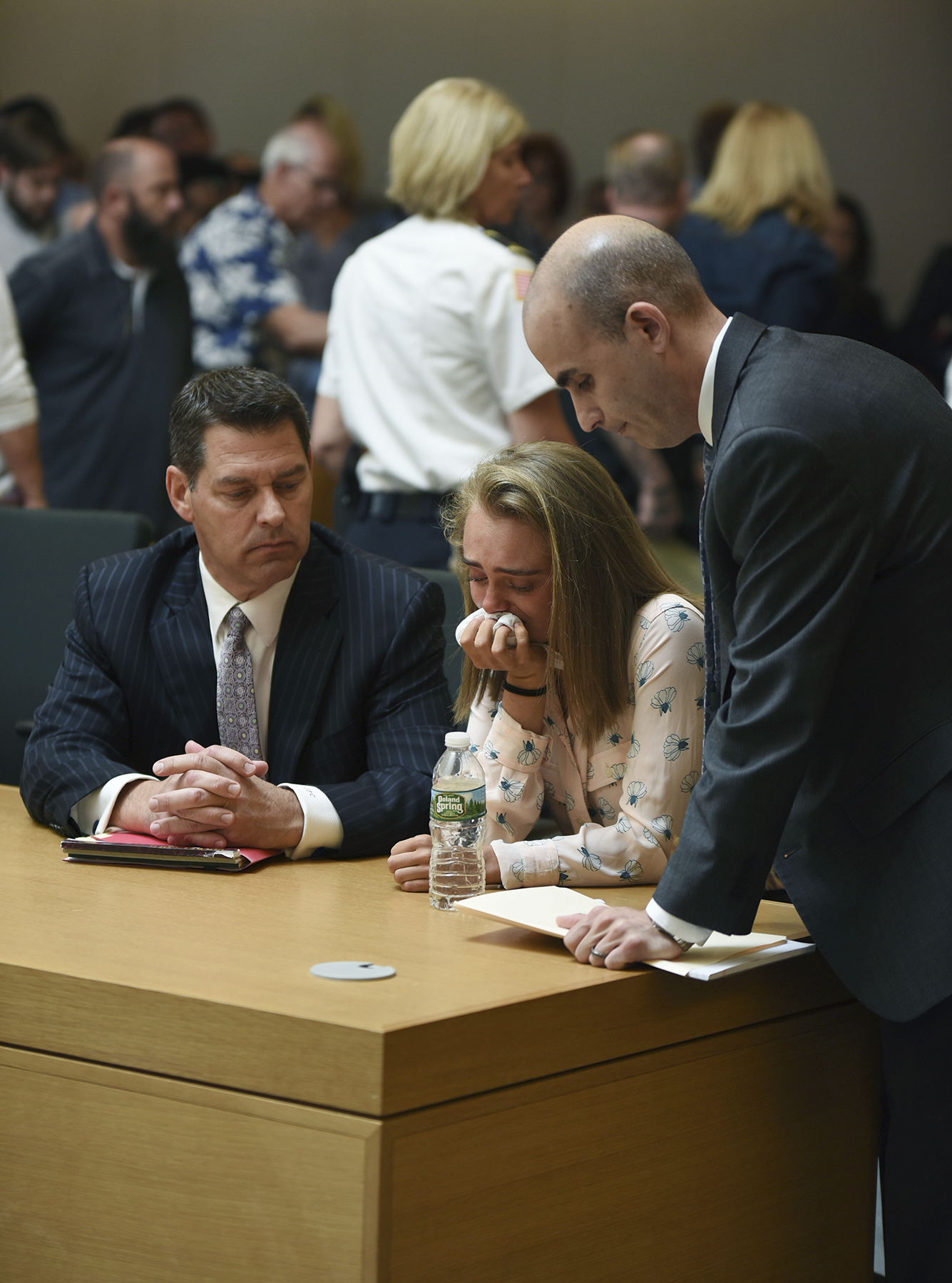 PHOTO: Michelle Carter cries while flanked by defense attorneys Joseph Cataldo, left, and Cory Madera, after being found guilty of involuntary manslaughter in the suicide of Conrad Roy III, June 16, 2017, in Bristol Juvenile Court in Taunton, Mass.