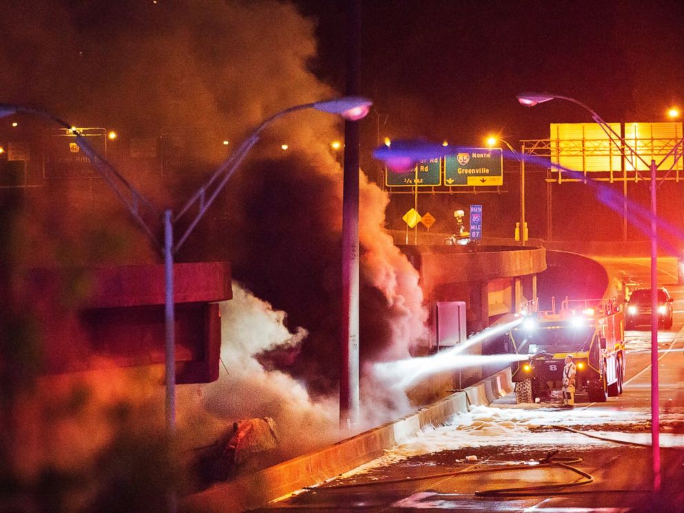 PHOTO: Smoke billows from a section of an overpass that collapsed from a large fire on Interstate 85 in Atlanta, March 30, 2017.