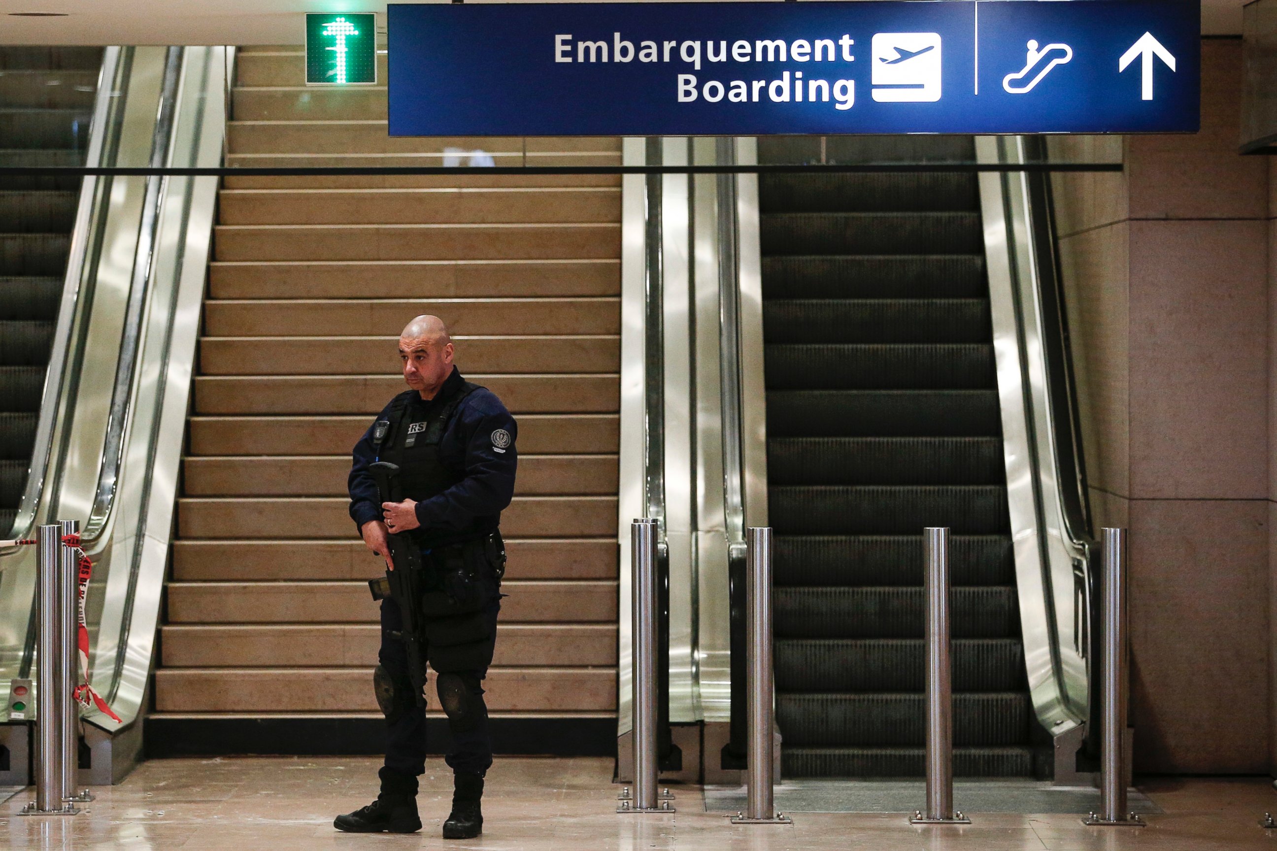 PHOTO: A riot police officer patrols inside Orly airport, south of Paris, as flights are gradually resuming, March, 18, 2017. 