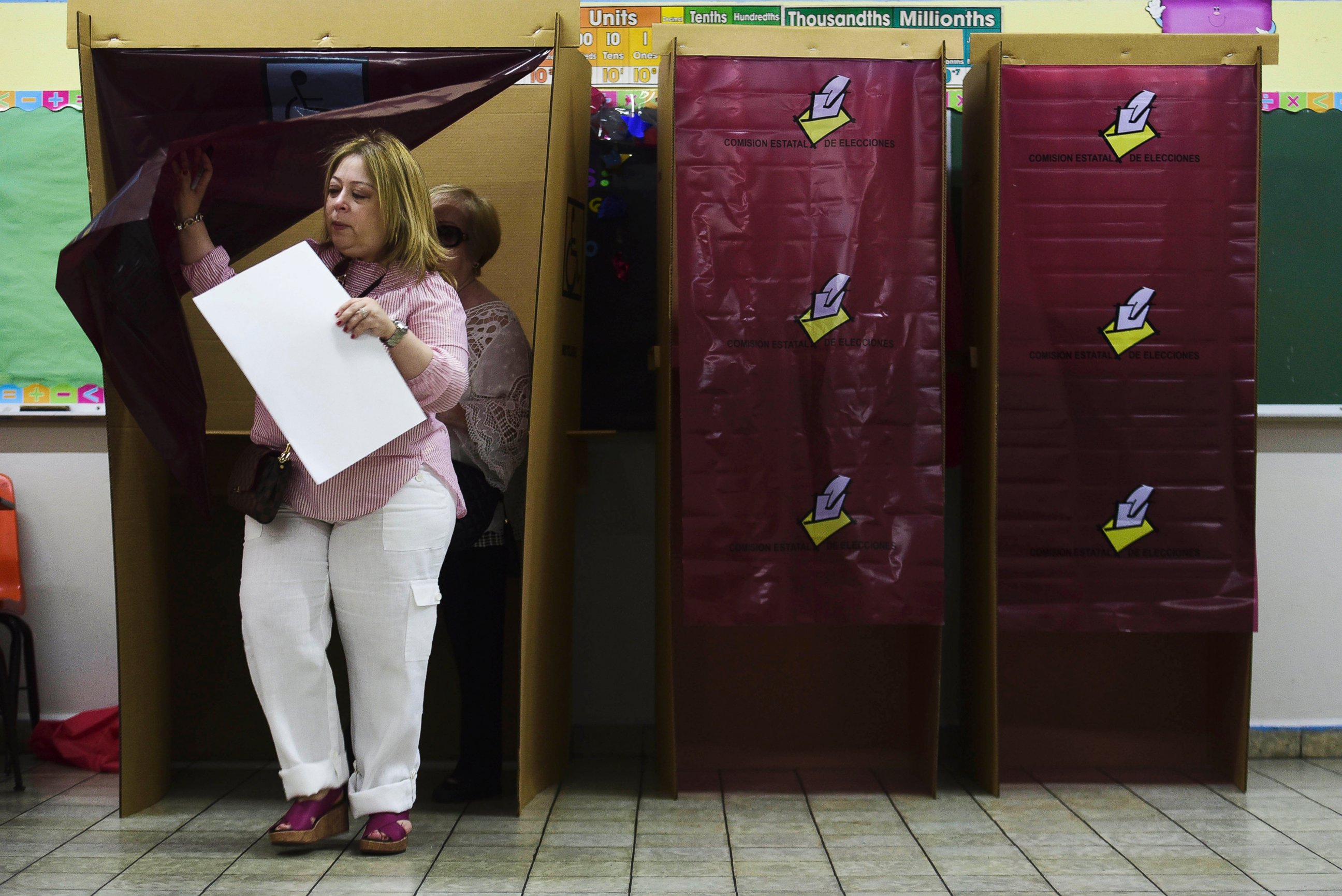 PHOTO: A woman votes during the fifth referendum in San Juan, Puerto Rico, June 11, 2017.  