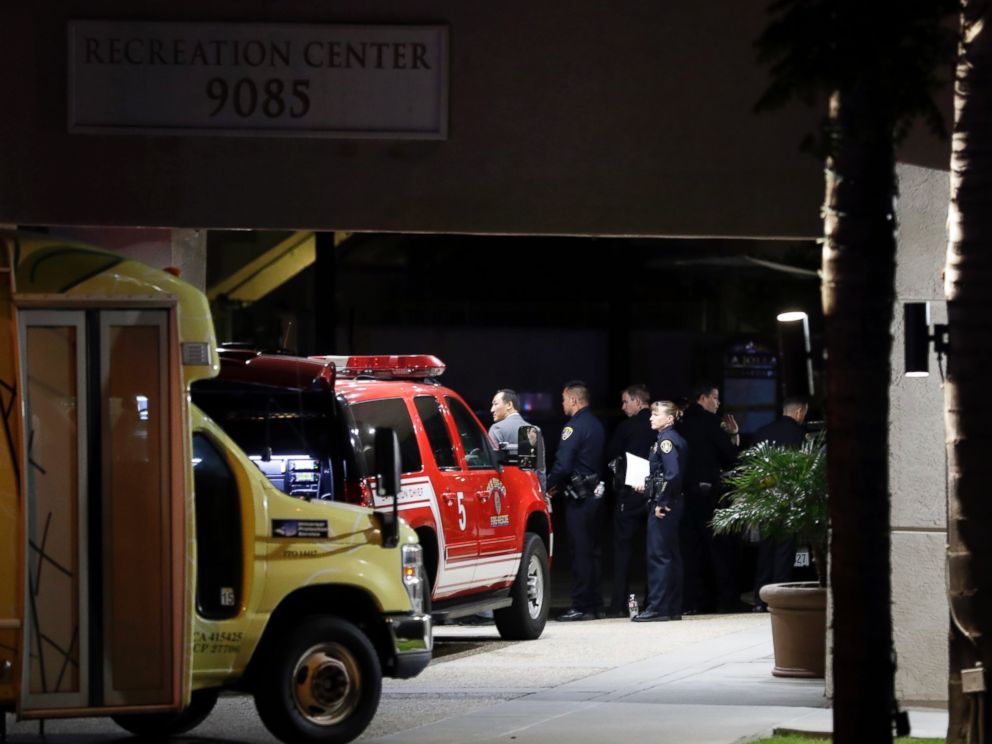PHOTO: Police officers stand guard in front a La Jolla apartment building after a shooting, April 30, 2017, in San Diego.