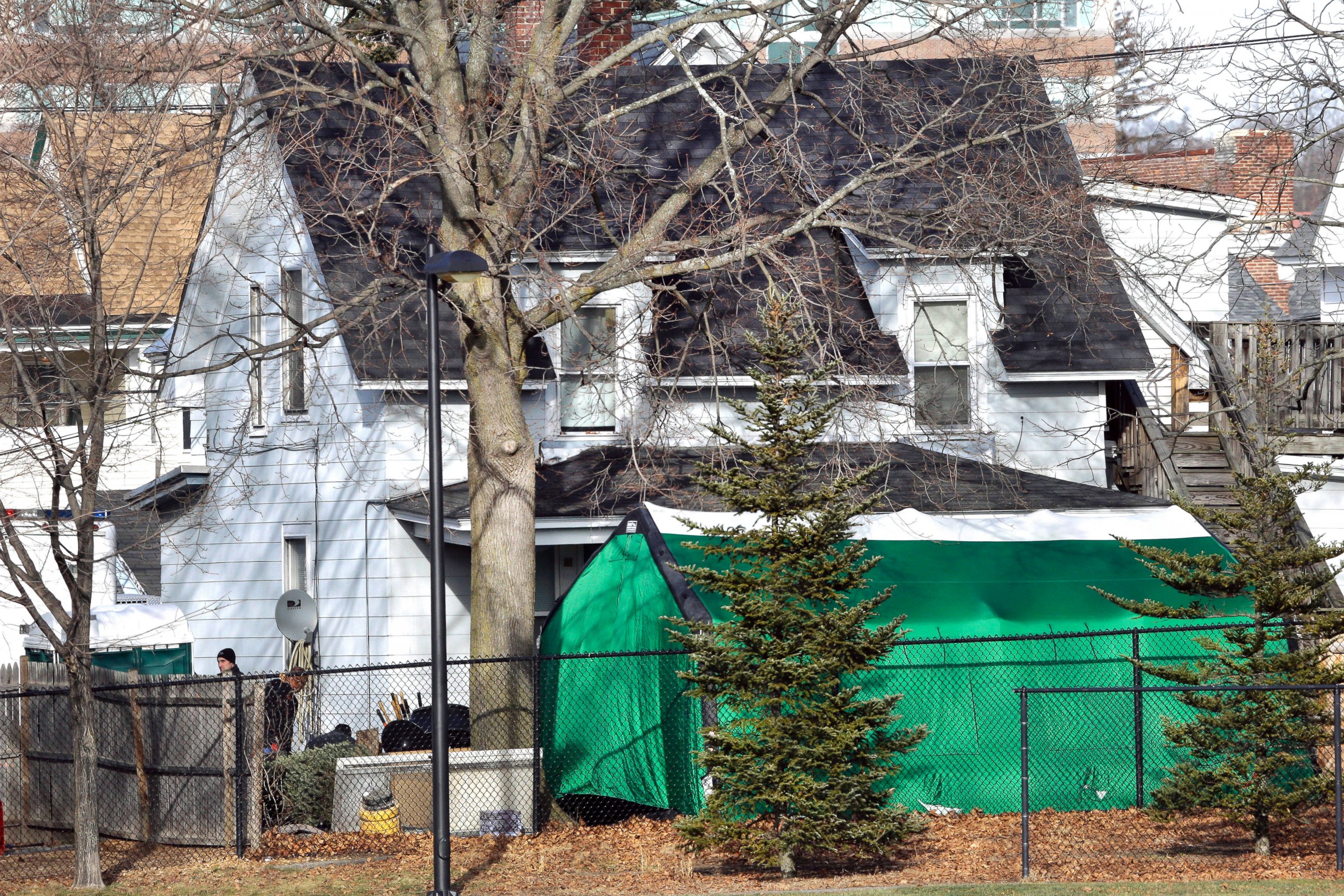 PHOTO: In this Jan. 17, 2017, file photo, a large green tent is seen in the back of a house on Hayward Street in Manchester, New Hampshire, where authorities searched for clues in the missing person's case of Denise Beaudin. 