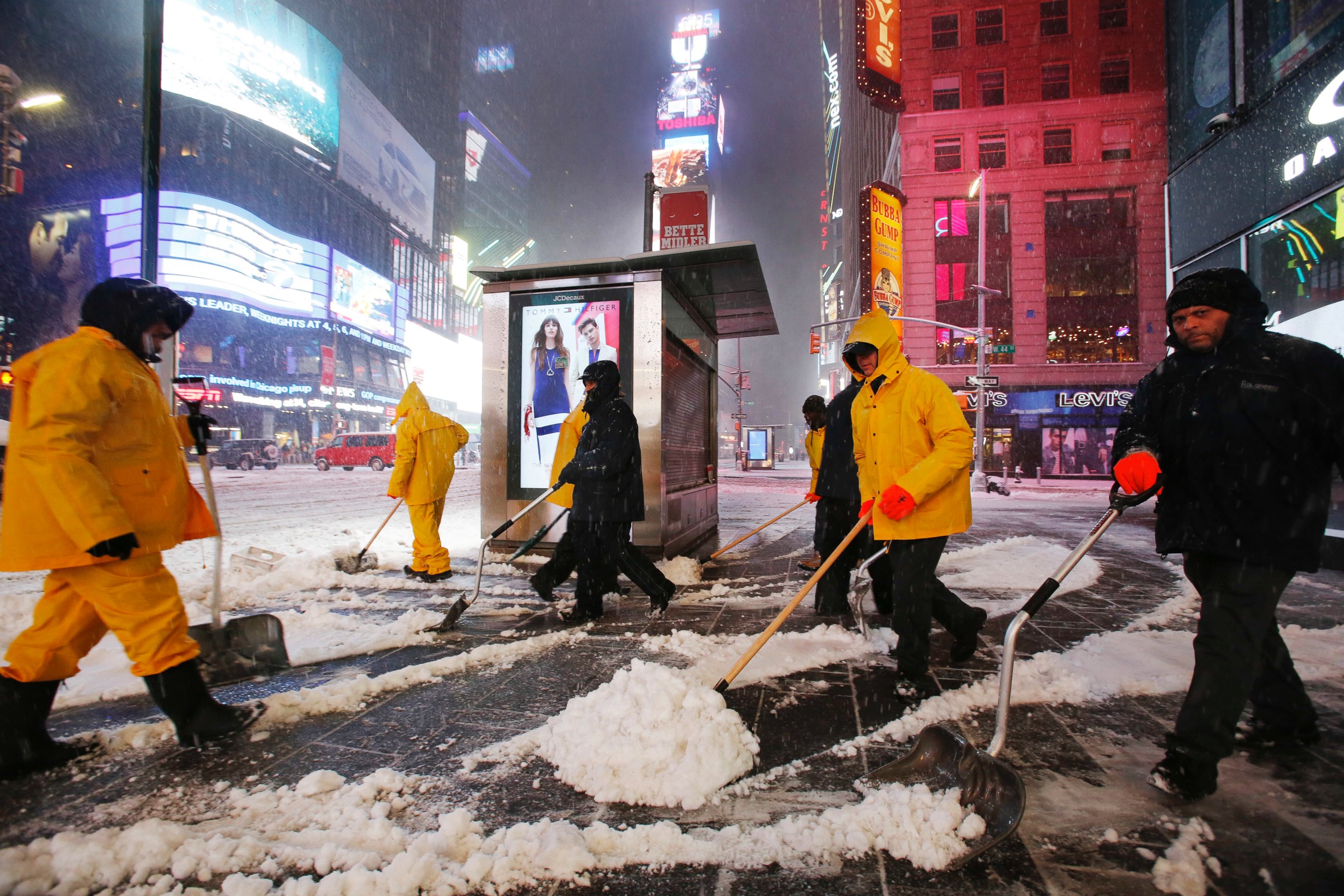 PHOTO: A crew works to remove snow as a snowstorm sweeps through Times Square, March 14, 2017, in New York.