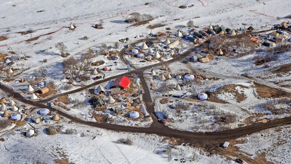 In this aerial photo the Sacred Stones Camp on the Standing Rock Indian Reservation and along the Cannonball River, where people have gathered to protest the Dakota Access oil pipeline, is seen in Cannon Ball, North Dakota, Feb. 13, 2017.