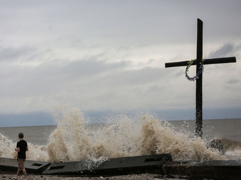 PHOTO: Tommy Bomar, of High Island, Texas, checks out the waves as a result of Tropical Storm Cindy, June 22, 2017, in Bolivar Peninsula, Texas.