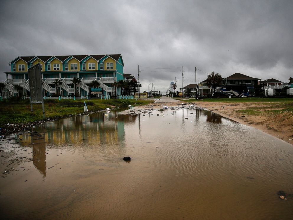 PHOTO: Water and debris, washed up past the beach by Tropical Storm Cindy, sit on Kahla Drive, June 22, 2017, in Crystal Beach, Texas.