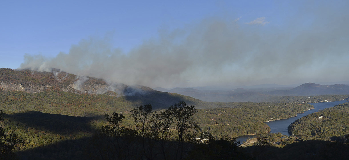 PHOTO: In this Wednesday, Nov. 9, 2016 photo, a wildfire burns near Lake Lure, North Carolina. A state of emergency is in effect for 25 western North Carolina counties where active wildfires are burning, caused by the drought that began last spring. 