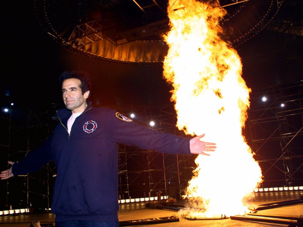 PHOTO: Illusionist David Copperfield stands in front of his Tornado of Fire Wednesday, March 28, 2001, in an empty pier in New York.