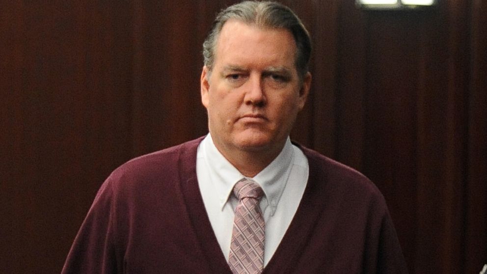 Michael Dunn returns to the courtroom during jury deliberations in his trial in Jacksonville, Fla., Thursday Feb. 13, 2014.