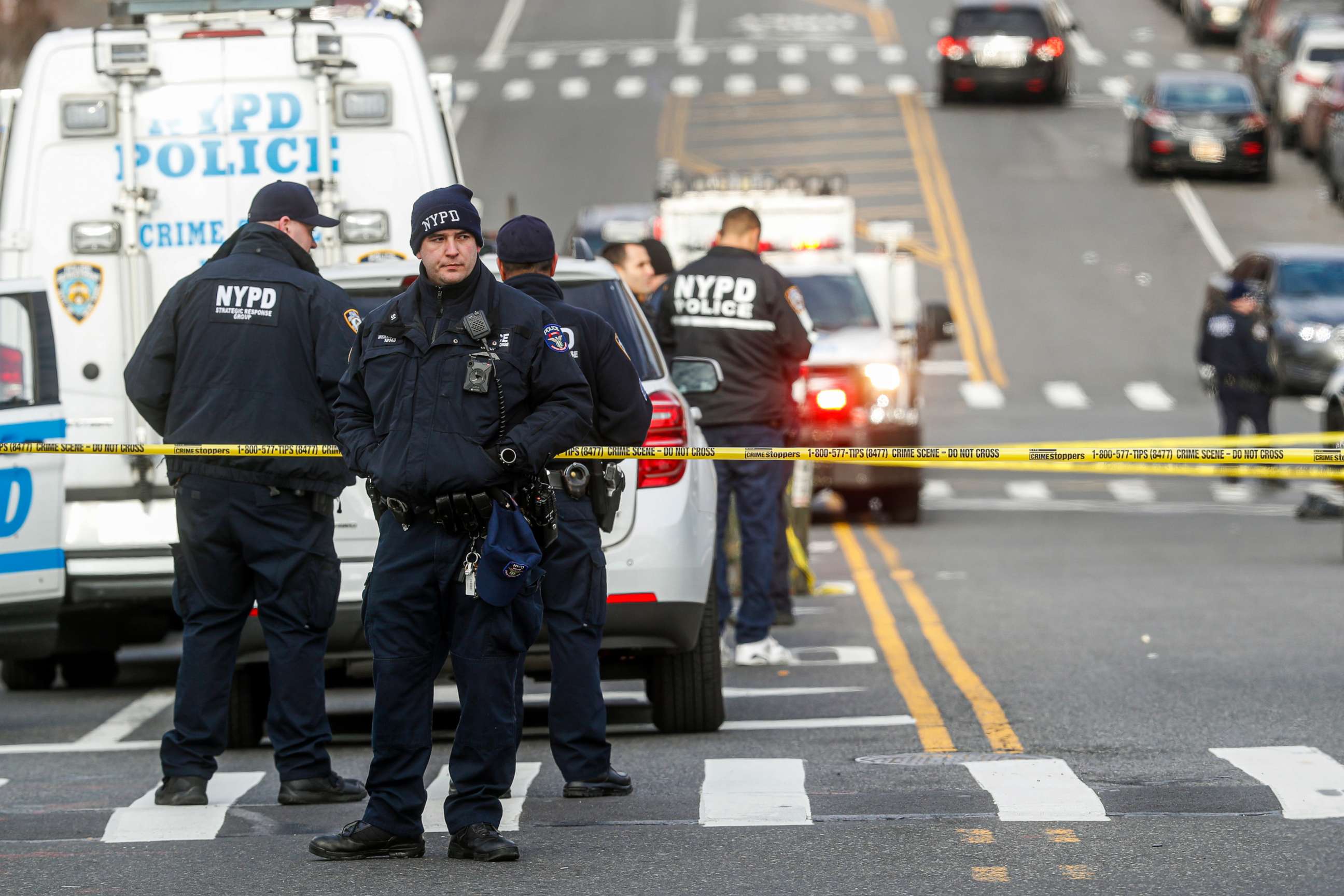 PHOTO: New York City police officers work the scene of a police-involved shooting outside the 41st precinct Sunday, Feb. 9, 2020, in New York. 