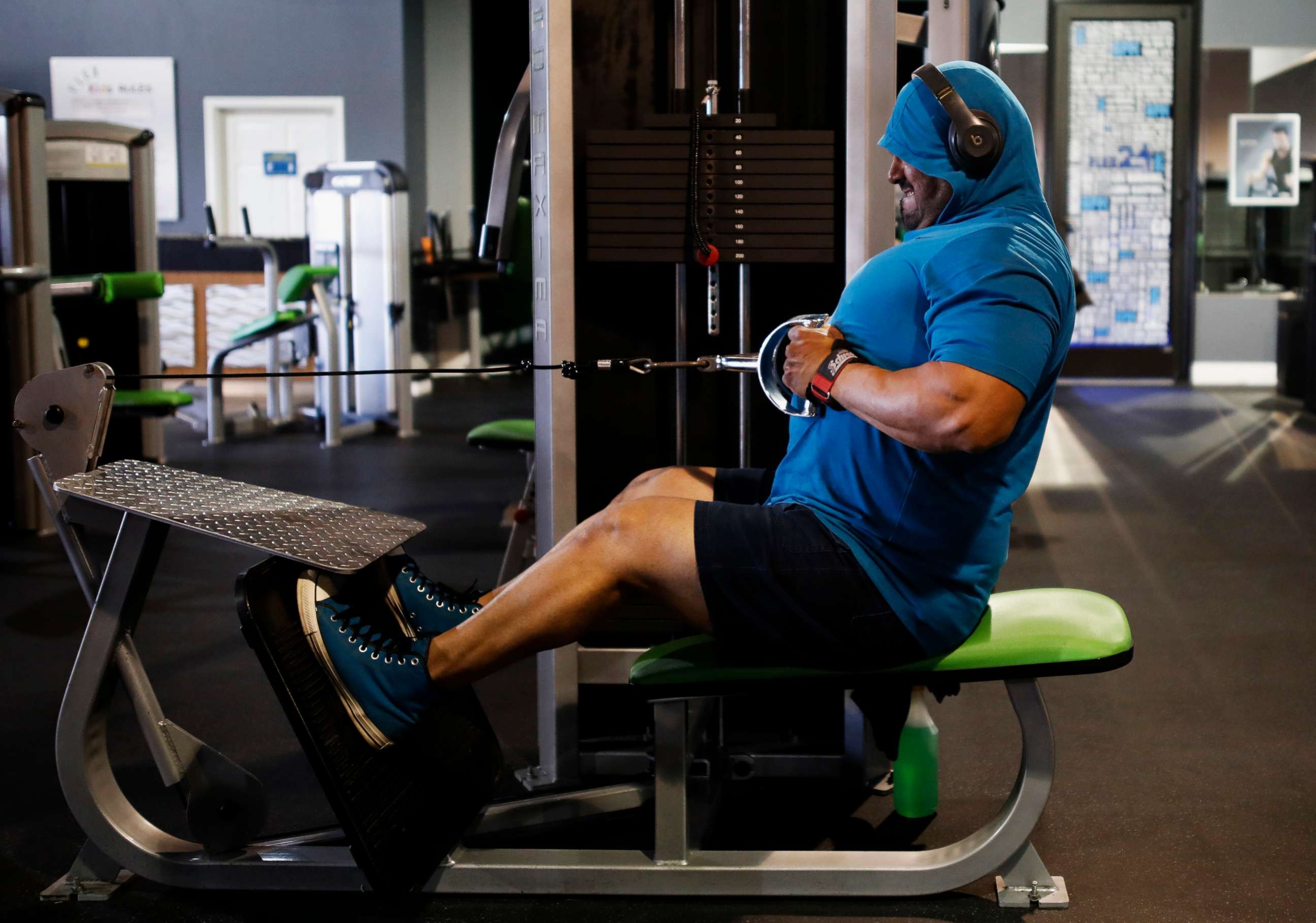 PHOTO: Ruben Munoz uses the seated rowing machine during his workout at Flex 24 in Odessa, Texas, May 18, 2020. 