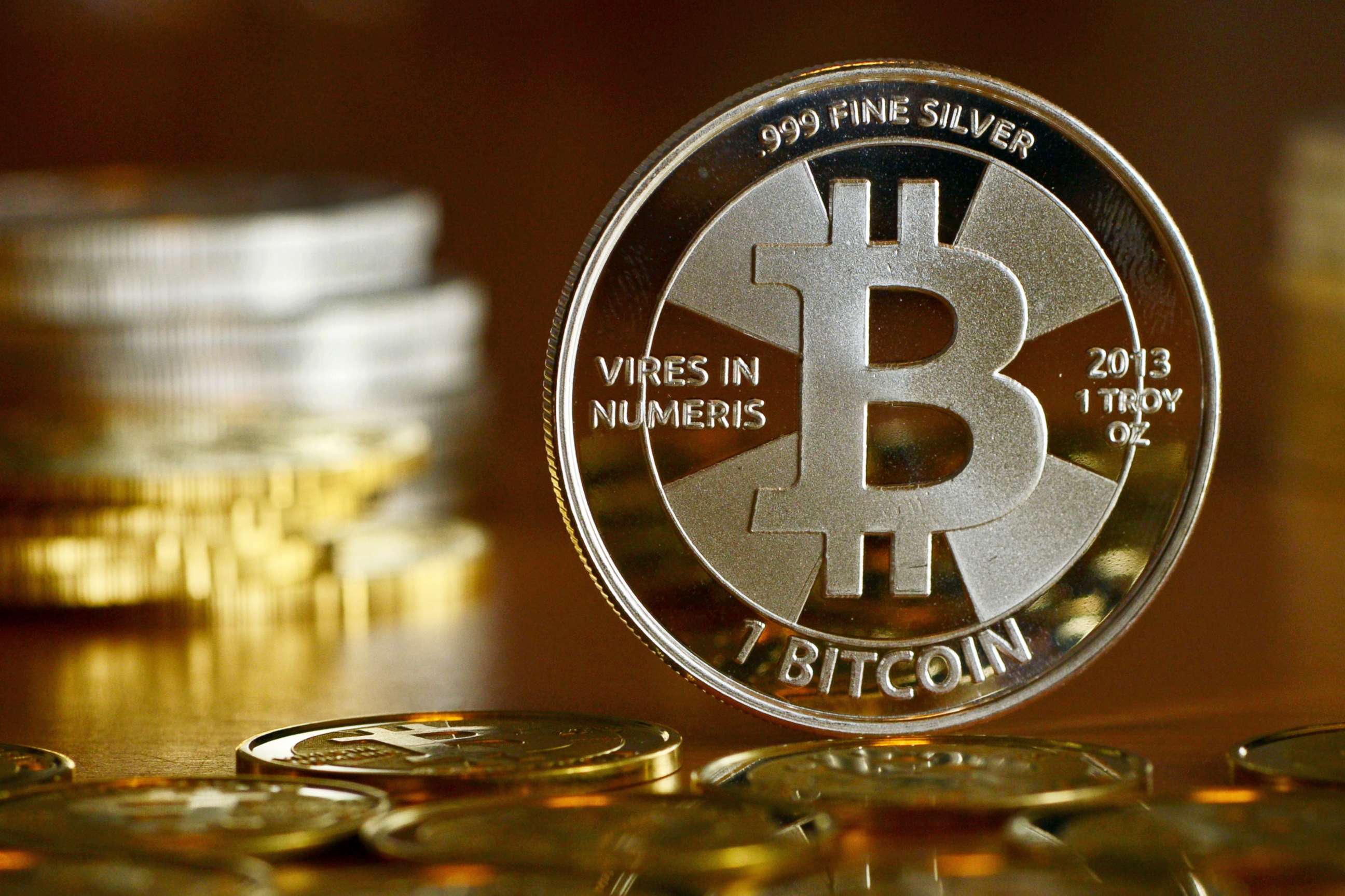 PHOTO: A Bitcoin is pictured at the coin dealer BitcoinCommodities in Berlin, Nov. 28, 2013. 