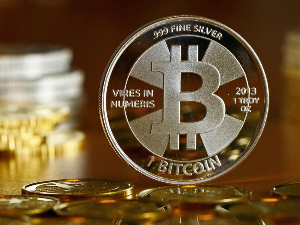 PHOTO: A Bitcoin is pictured at the coin dealer BitcoinCommodities in Berlin, Nov. 28, 2013.