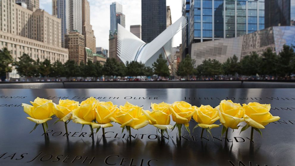 Yellow roses are placed over the name of Robert Clinton Kennedy at the World Trade Center Memorial, Sept. 9, 2016, in New York.