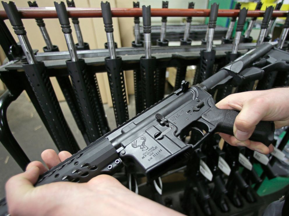 PHOTO: Craftsman Veetek Witkowski holds a newly assembled AR-15-style rifle at the Stag Arms company in New Britain, Conn. on April 10, 2013.