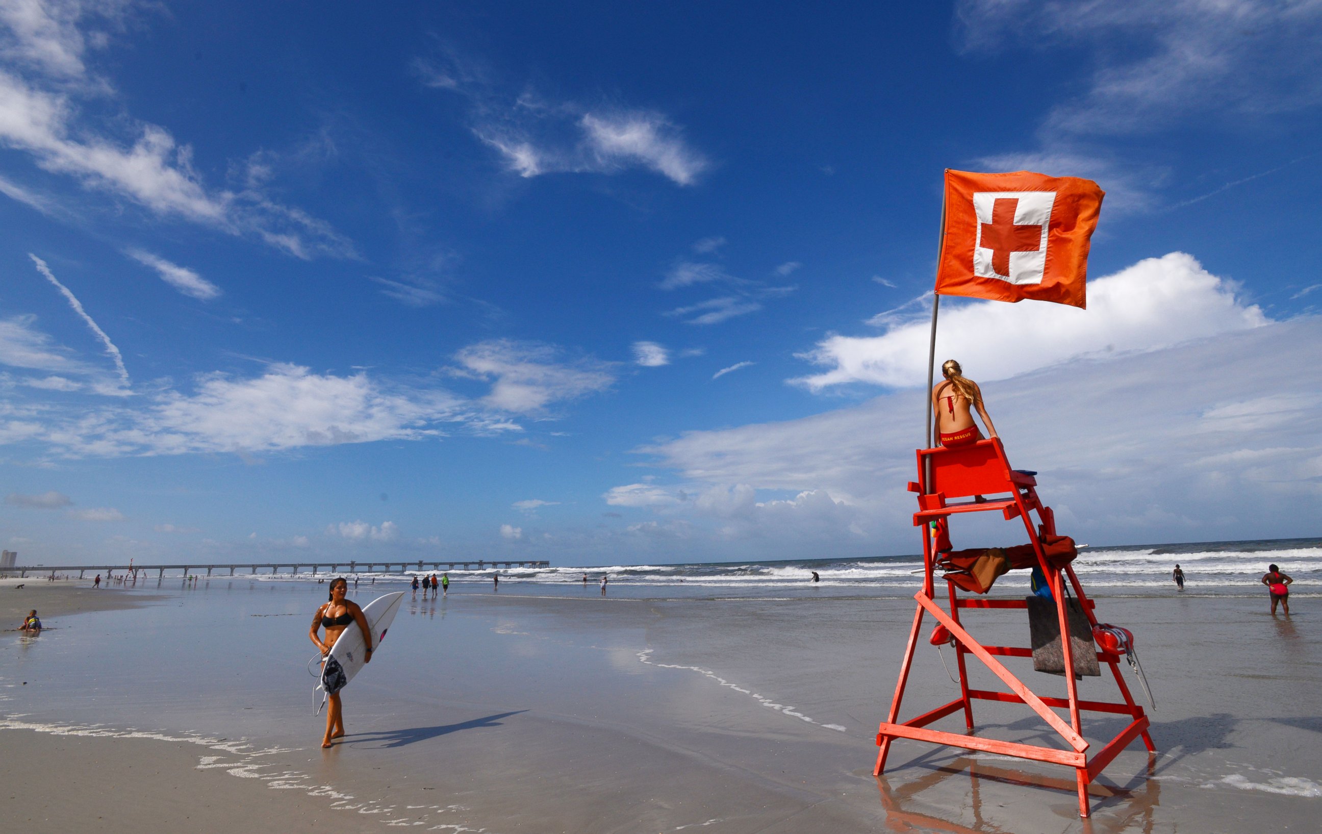 PHOTO: Elise Byrd with the American Red Cross Volunteer Life Saving Corps watches to make sure people venturing into the surf off of Jacksonville Beach, Fla. stayed safe, July 2, 2014.