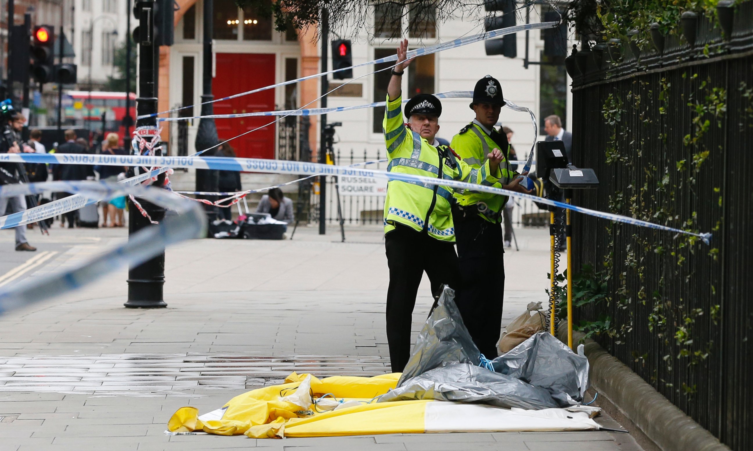 PHOTO: Police forces clear police tape off a knife rampage at Russell Square in London, Aug. 4, 2016. 