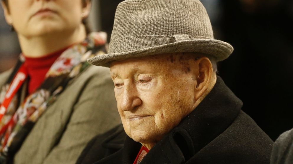 S. Truett Cathy, the founder of Chick-fil-A, watches teams warming up before the first half of the Chick-fil-A Bowl NCAA college football game between Clemson and LSU in Atlanta, Dec. 31, 2012.