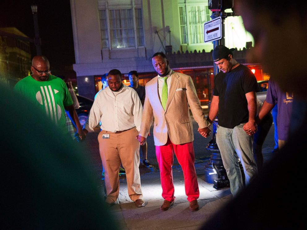 PHOTO: Worshippers gather to pray down the street from the Emanuel AME Church following a shooting, June 17, 2015, in Charleston, South Carolina.