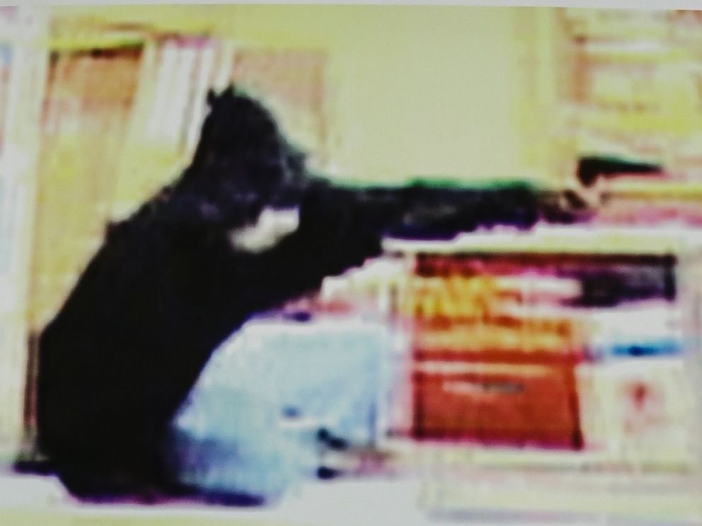 PHOTO: Frame grabs from security video showing an armed robbery at a Wendys restaurant in Omaha, Neb., released Aug. 27, 2014.